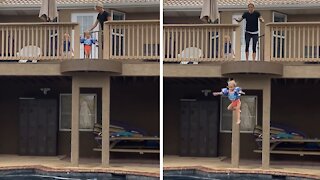 Fearless Toddler Jumps From Impressive Height Into Pool