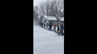 Lomira wrestling team digs their neighbors out of snow