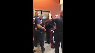 Hilarious video of firefighters rescuing police from elevator