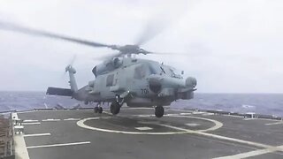 This MH 60R Helicopter Conducts Takeoff aboard Carrier USS -US-NAVY