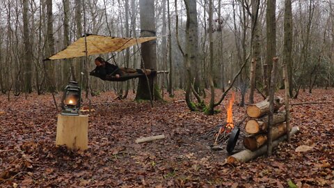 floating bushcraft tree bed - constructing and sleeping on floating tree bed in a woodland