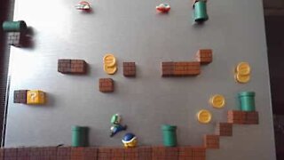 Super Mario game recreated using stop-motion of magnets on fridge