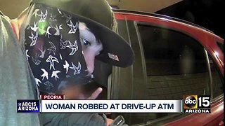 Suspect sought after robbing woman at knifepoint at Peoria drive-up ATM