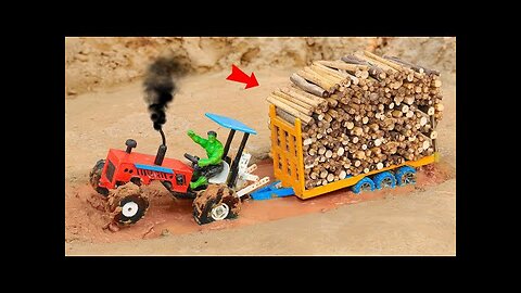 full trolley wood loaded mini diy tractor stuck in mud on dangerous situation