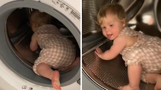 Curious Baby Decides To Explore The Washing Machine