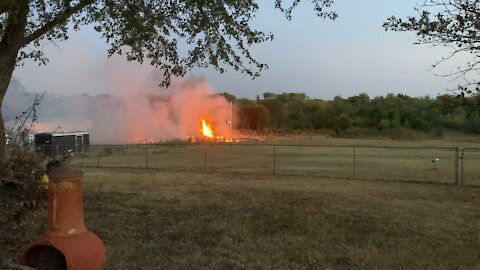 Neighbor starts grass fire on high risk day