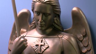 New St. Michael statue dedicated at Marquette University Police headquarters