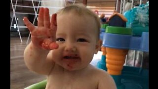 Baby reacts to sour frozen berries