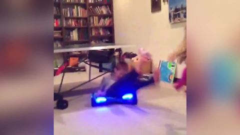 "A Young Boy Spins on A Hoverboard and Gets Slammed"