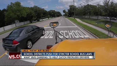 Districts working to target drivers who pass school buses