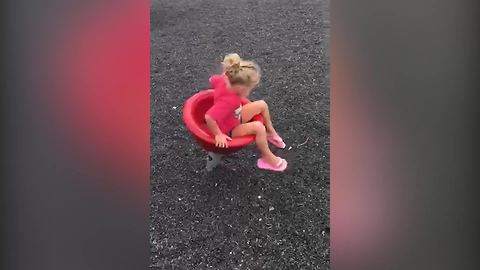 Little Girl Gets Dizzy After Spinning On A Playground