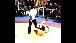 khabib performing a flying armbar.