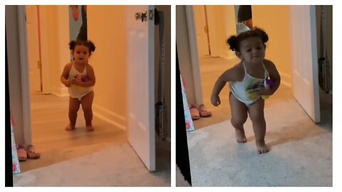 this adorable baby girl dancing