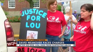 Man accused of abusing dog faces crowd outside courthouse