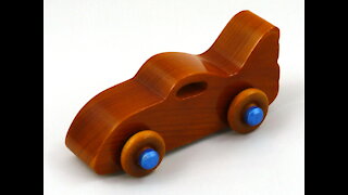 Handmade Wood Toy Bat Car from the Play Pal Series Amber Shellac with Metalic Blue Trim