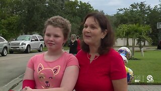 Vero Beach welcomes home child after she beats cancer