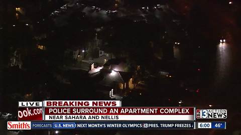 Police surround apartment complex near Sahara, Nellis