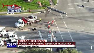 Driver slams into concrete pole in West Palm Beach along Village Boulevard