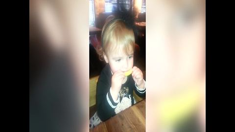 This Girl Trying a Lemon for the First Time is So Cute