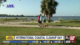 Volunteers cleaning community on International Coastal Cleanup Day