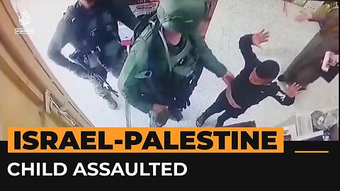 Palestinian boy assaulted by Israeli forces over ‘gun’ shirt _ Al Jazeera Newsfeed