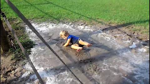 Tot Girl Falls Into A Mud Puddle