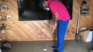 Man pulls amazing mini golf trick shots at home