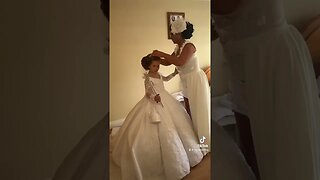 Ladies in white mother and daughter at communion