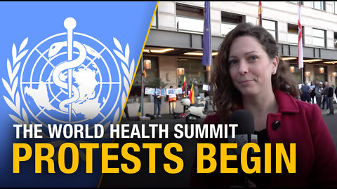 Protestors gather to denounce the World Health Organization ahead of Berlin health summit