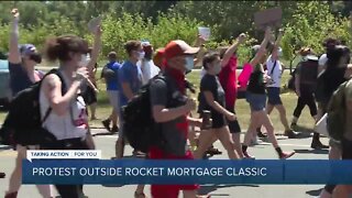 Protesters gather outside Rocket Mortgage Classic tournament