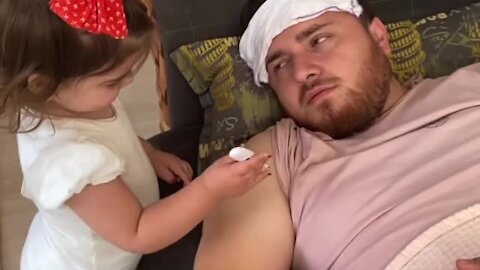 Compassionate Little Girl Preciously Takes Care Of Her Sick Dad
