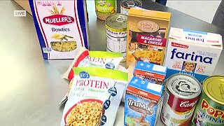 Harry Chapin Food Bank prepare hunger relief kits for families in SWFL
