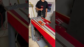 Couple kids running their fresh built Slot Cars. A 68 Camaro & a 58 Plymouth Fury