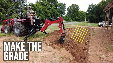 Drainage Ditch Grade with a Tractor Backhoe
