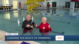 Reporter T.A. Walker learns to swim at age 46