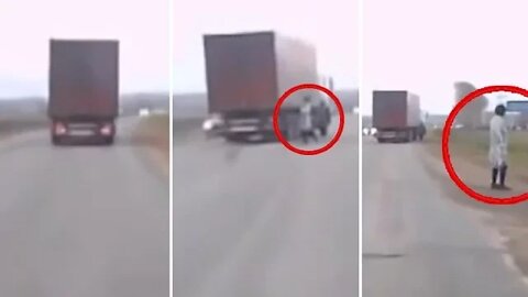 Mysterious Man in Lab Coat ‘TELEPORTS’ Onto Busy Road Almost Hit by Truck