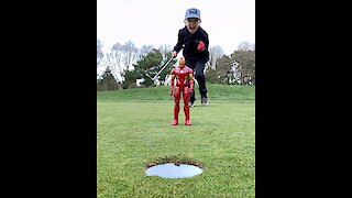 Watch this kid pull off an epic golf trick shot