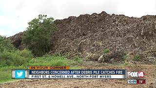 Thirty feet Hurricane Irma debris pile living in neighbors' backyard