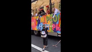 VIDEO: A child is given a progress pride flag and then throws it on the floor and stomps on it