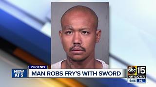 Man robs grocery store with sword