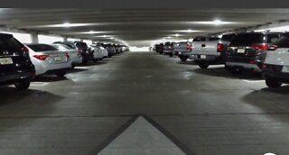 Are there security cameras at Palm Beach International Airport parking garages?