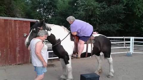 Woman Tries To Get Off A Horse