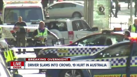 Driver arrested after slamming into crowd in Australia