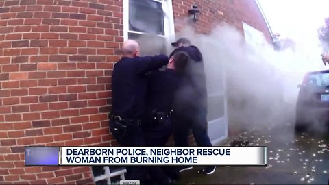 Video shows Dearborn officers rescue unconscious woman from burning home