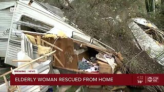 Large oak tree smashes into a Pasco County home, trapping elderly woman