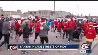 Thousands of runners take part in the Santa Hustle