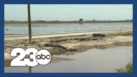 Crews work to raise Corcoran Levee