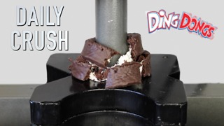 Crushing a cupcake with hydraulic press