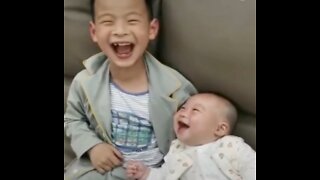 This baby laughs very beautifully and his brother laughs too. So cool