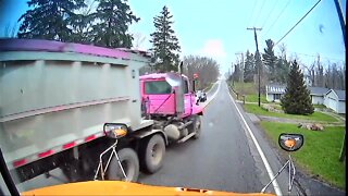 Video shows tractor-trailer nearly crash into school bus full of kids in Medina County